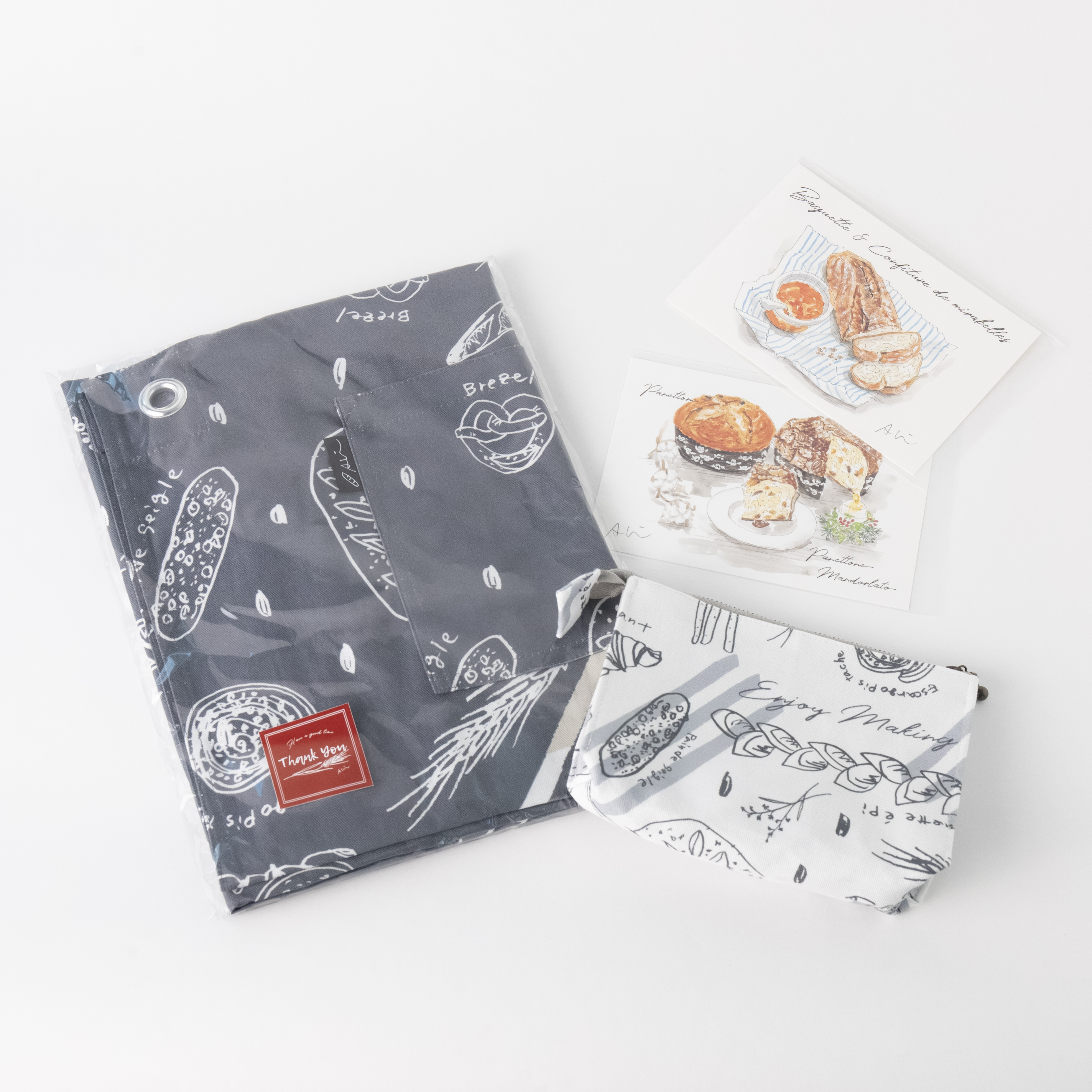 【パン柄モノトーンエプロンセット】
（エプロン、ポーチ、ポストカード2枚）